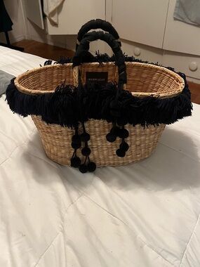 nannacay Fringe Pom Straw Tote with Black Trim